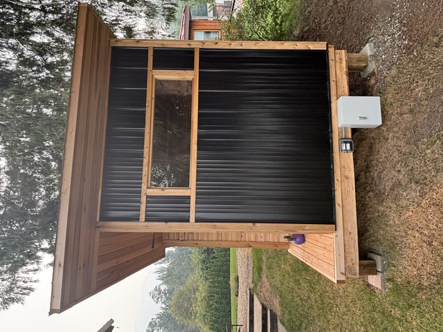 Side view of the home sauna with picture window